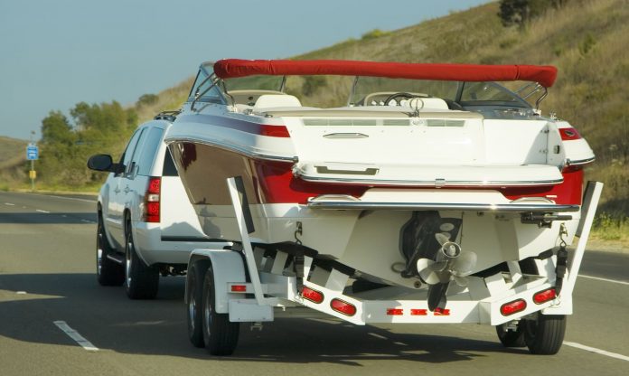 Safe and Secure: How Boat Towing Services Can Help Protect Your Investment